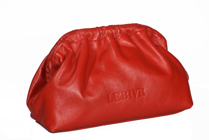 Red leather clutch bag with brand logo LEBIVR against white background