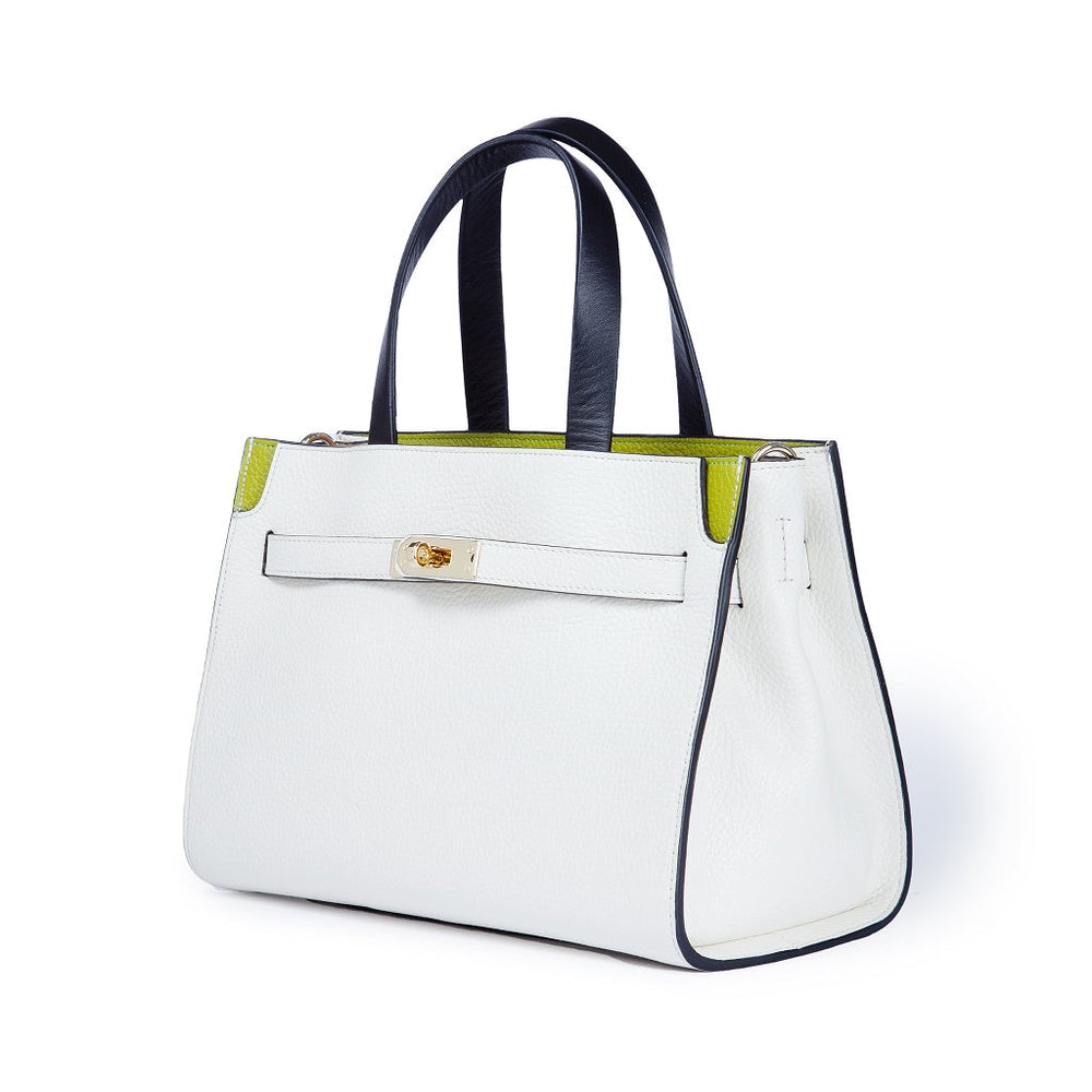 White leather handbag with dark handles and lime green accents