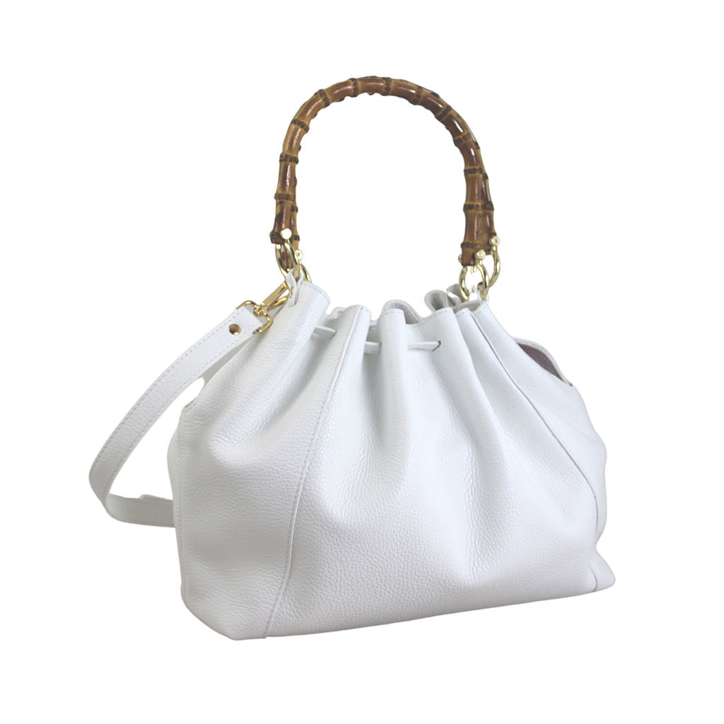 White leather handbag with bamboo handle and shoulder strap