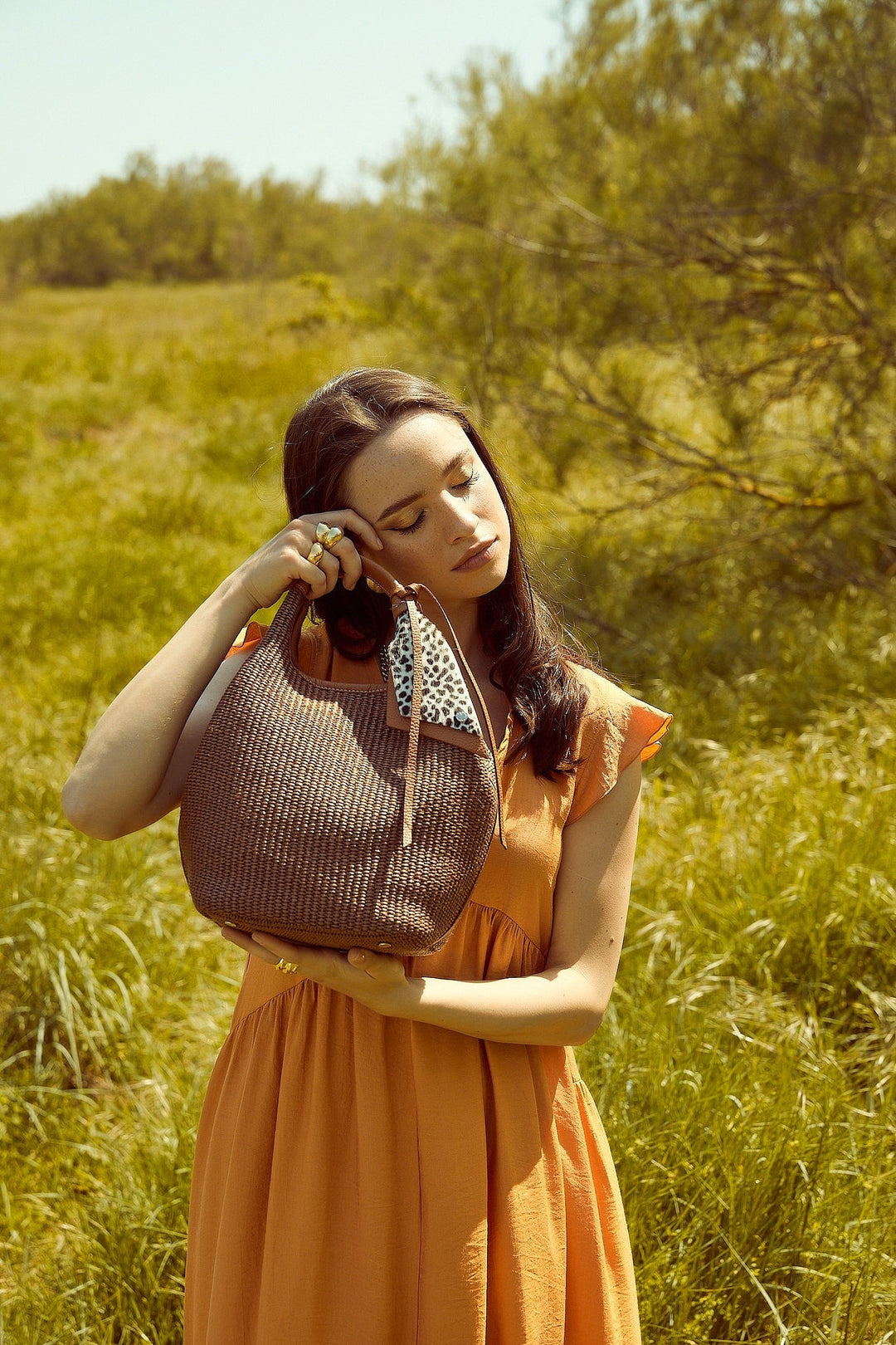 Beatrice Handbag in raffia leather trim with animal detail and detachable shoulder strap