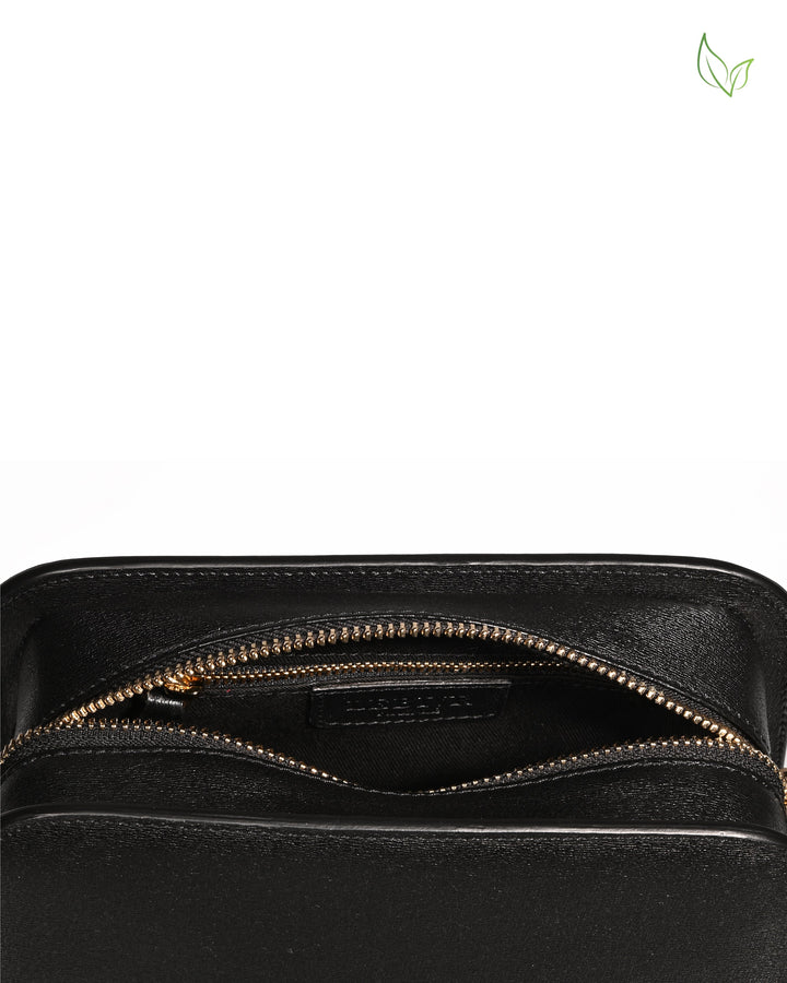 Black leather wallet with gold zipper partially open