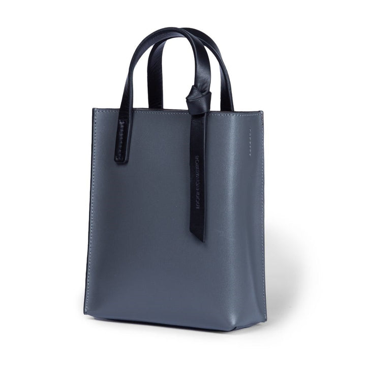 Stylish gray leather tote bag with black handles