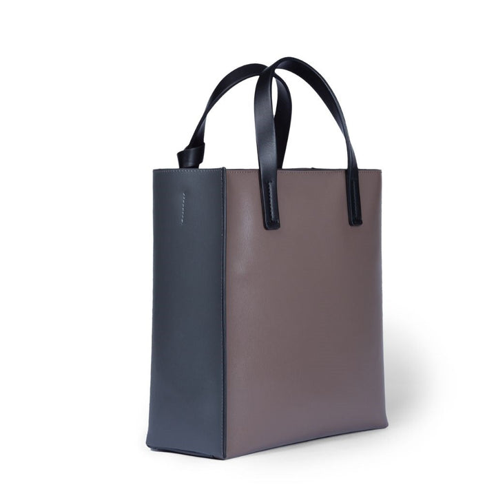 Two-tone leather tote bag with black handles