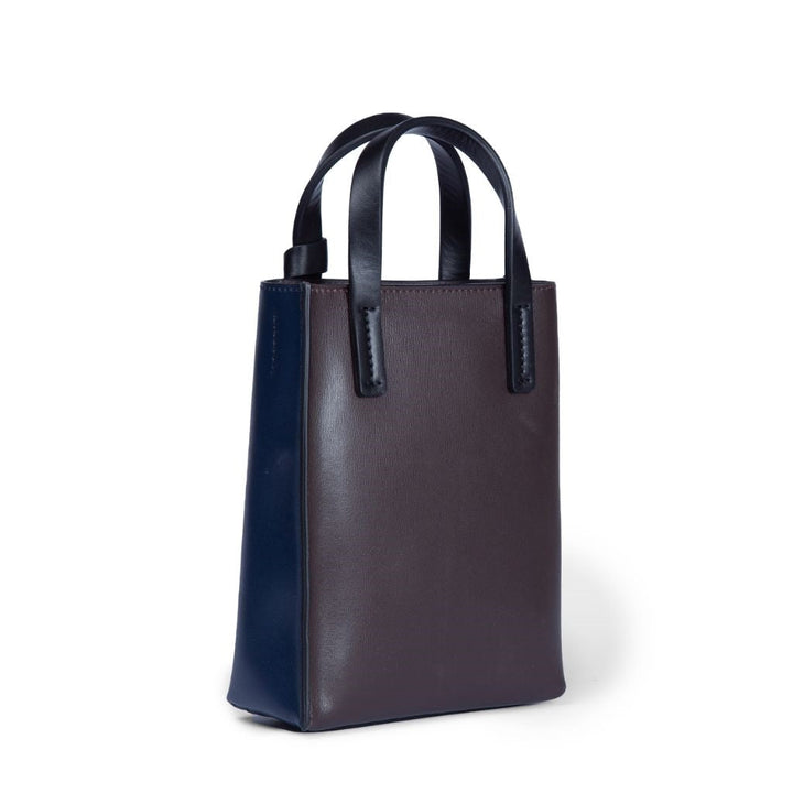 Stylish brown and navy leather handbag with dual handles