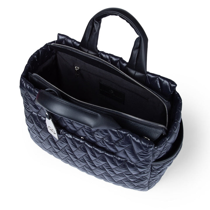 Black quilted handbag with a spacious interior and zipper compartment