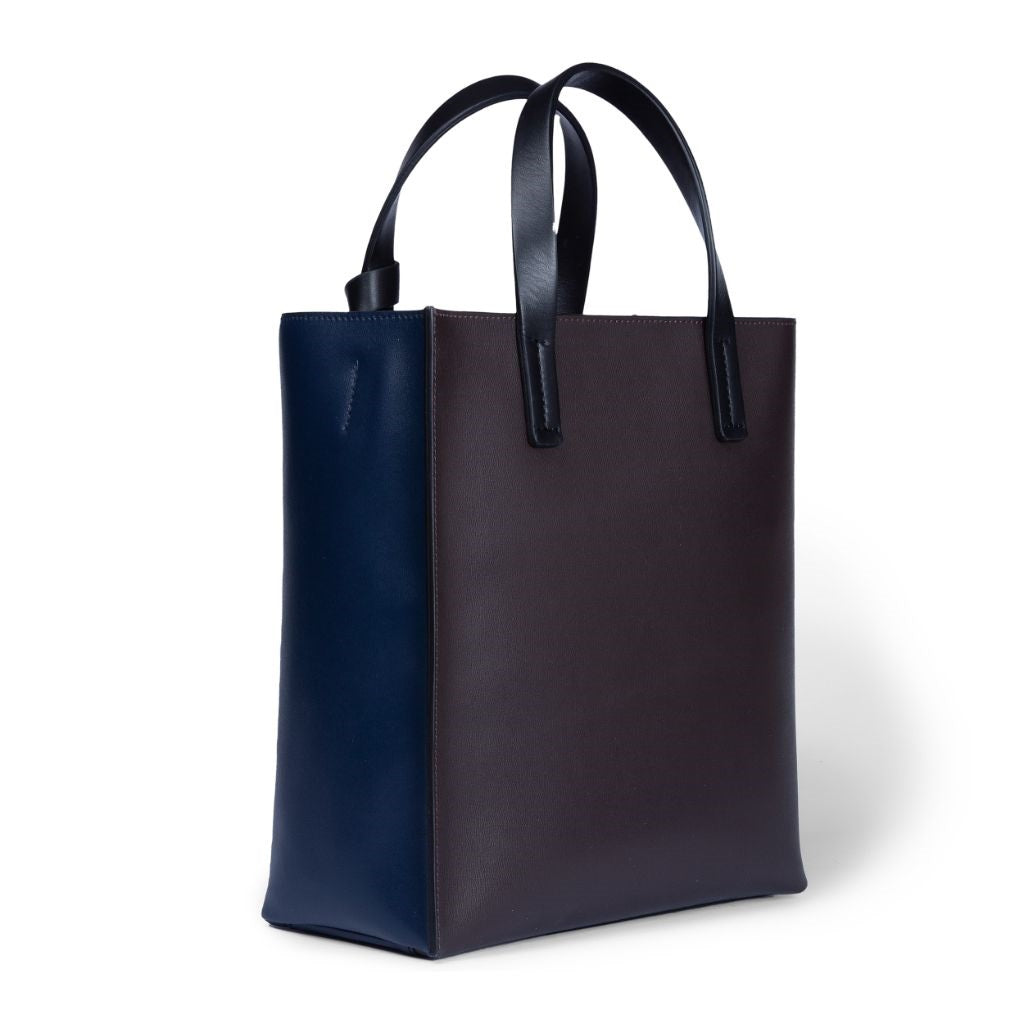 Elegant navy and brown leather tote bag with black handles