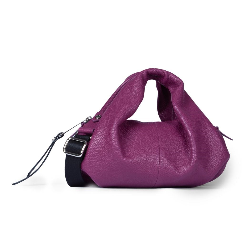 Trendy purple leather handbag with unique design and adjustable strap