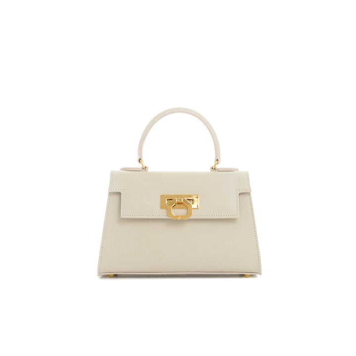 Elegant white handbag with gold clasp and top handle