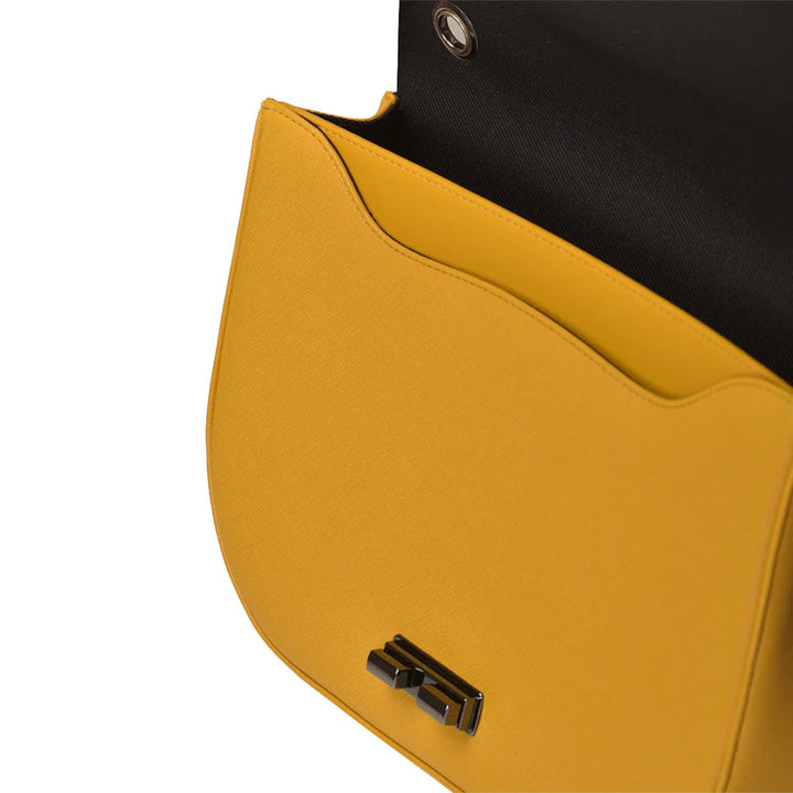 Yellow handbag with black interior lining, partially open, displaying front clasp detail