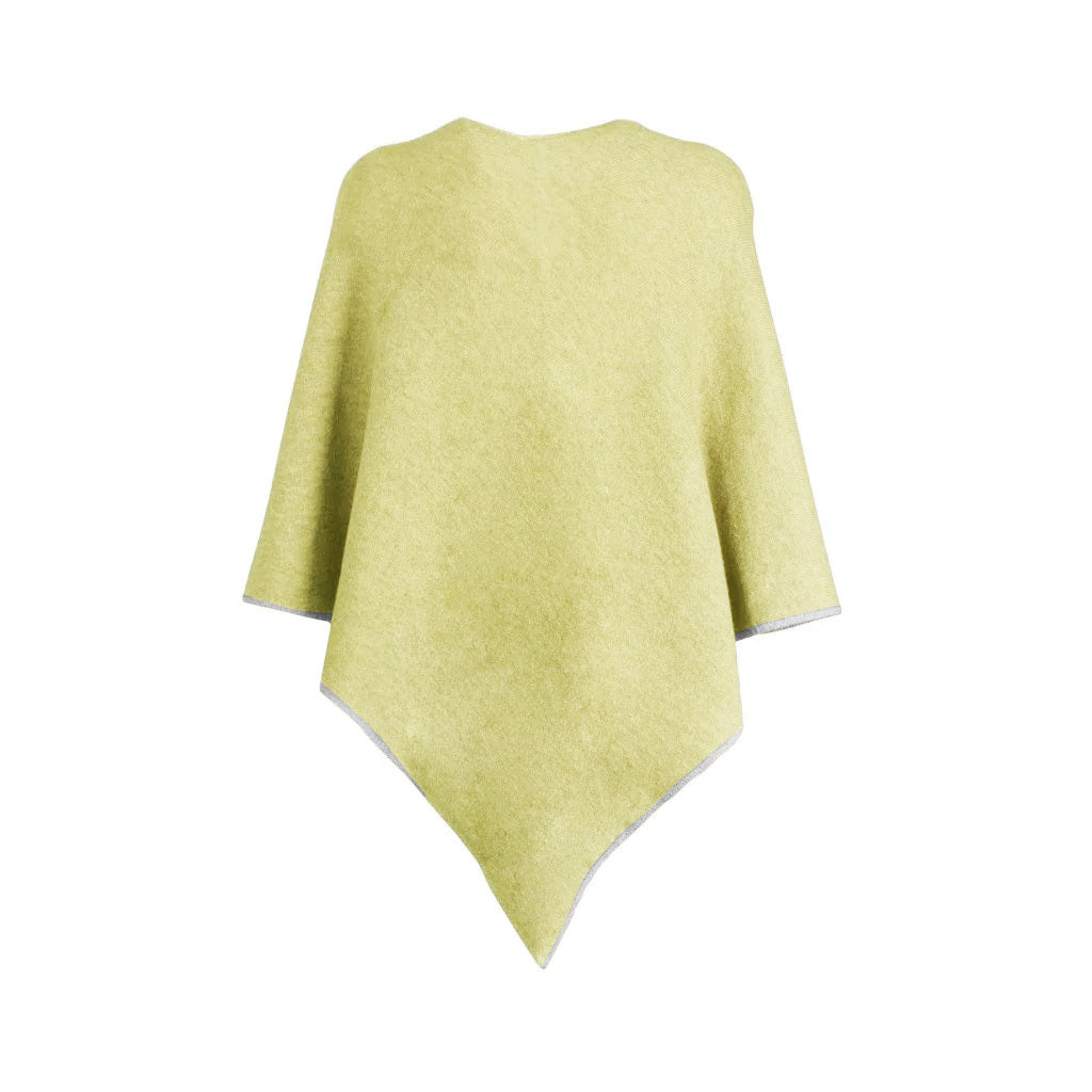 Yellow wool poncho with pointed hemline on white background