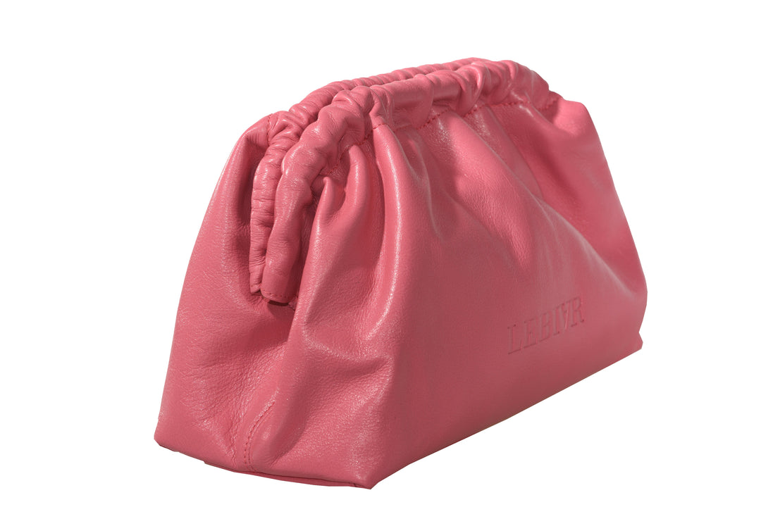Pink leather clutch bag with ruched top