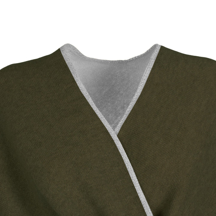 Close-up of a green V-neck garment with white trim