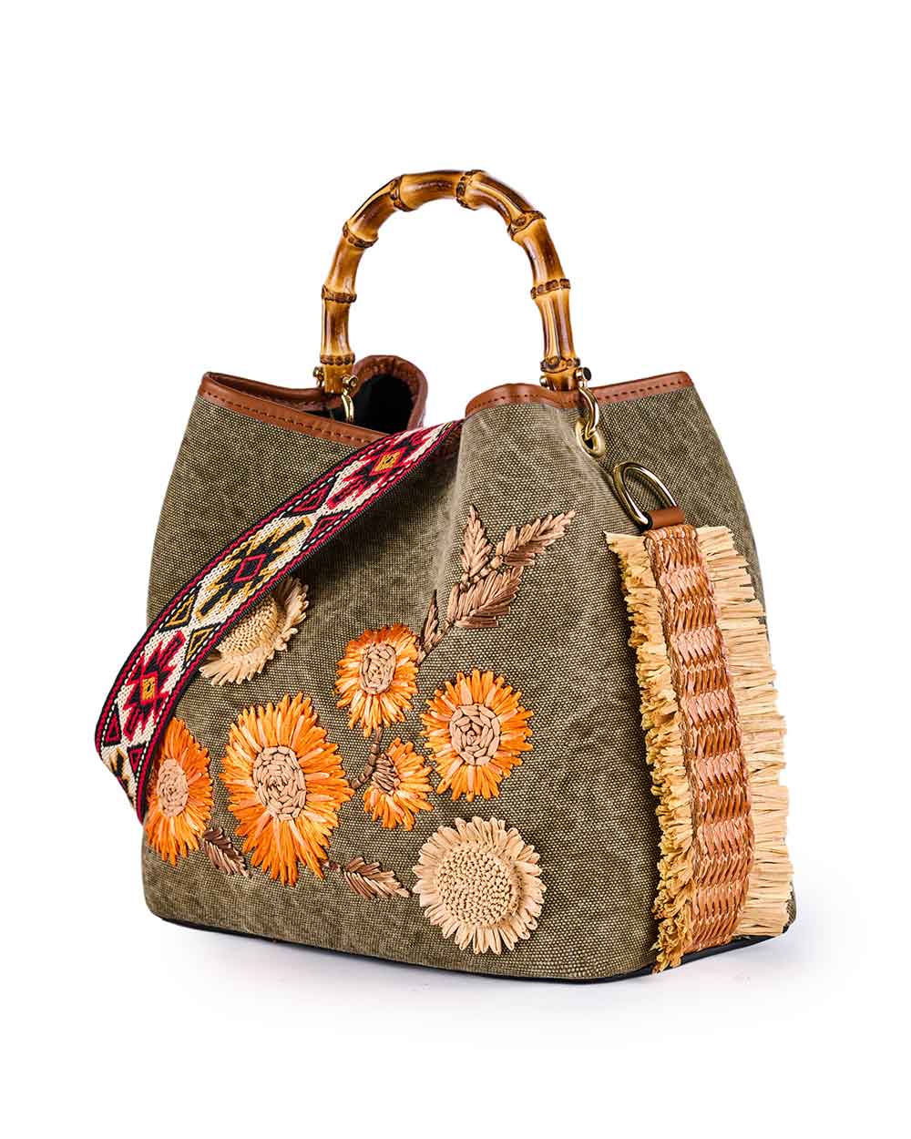 Handbag with bamboo handle, floral embroidery, and decorative woven strap