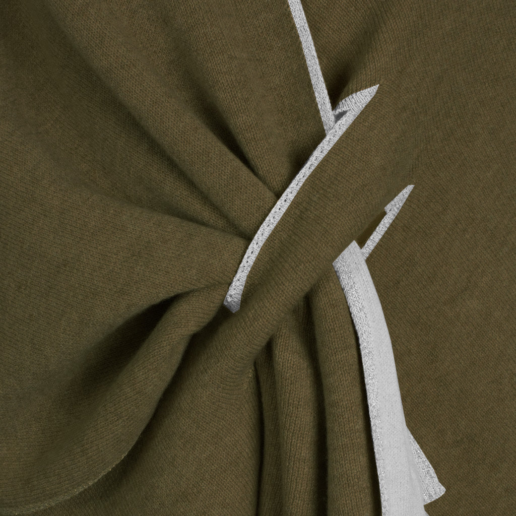 Close-up of olive green fabric with white ribbon detail