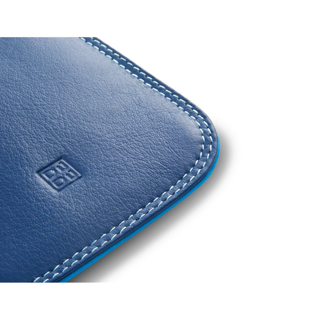 Close-up of a blue leather product with stitching and a debossed logo