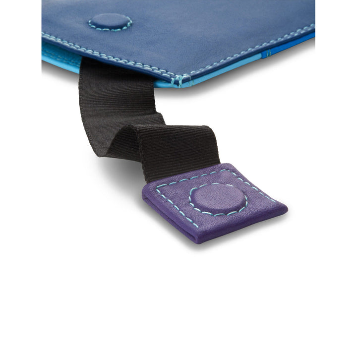 Close-up of leather tablet case clasp with purple and blue stitching