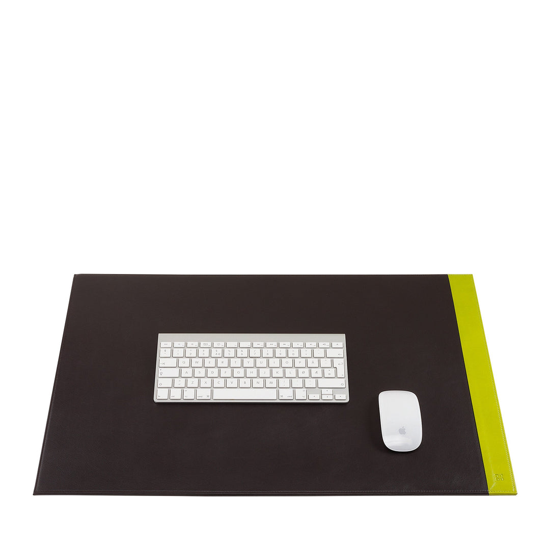 Black desk pad with keyboard and mouse on white background