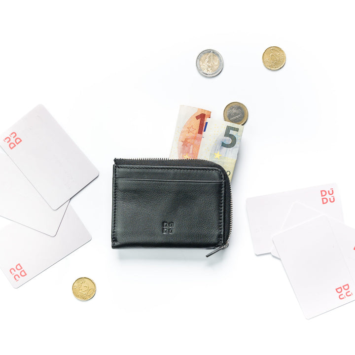 Black leather wallet with euro banknotes, coins, and credit cards on white background
