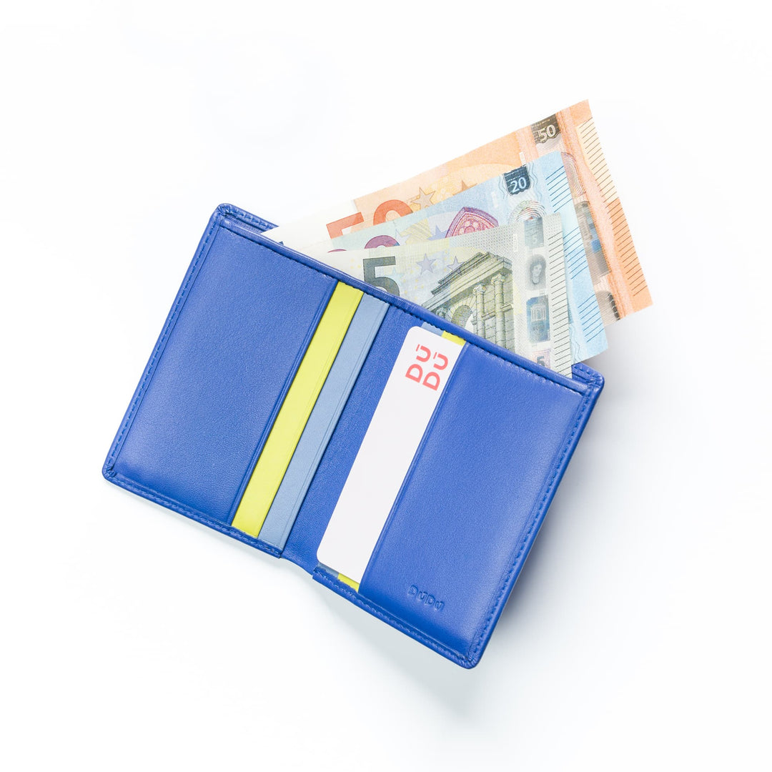 Blue wallet with multiple credit cards and euro banknotes on white background