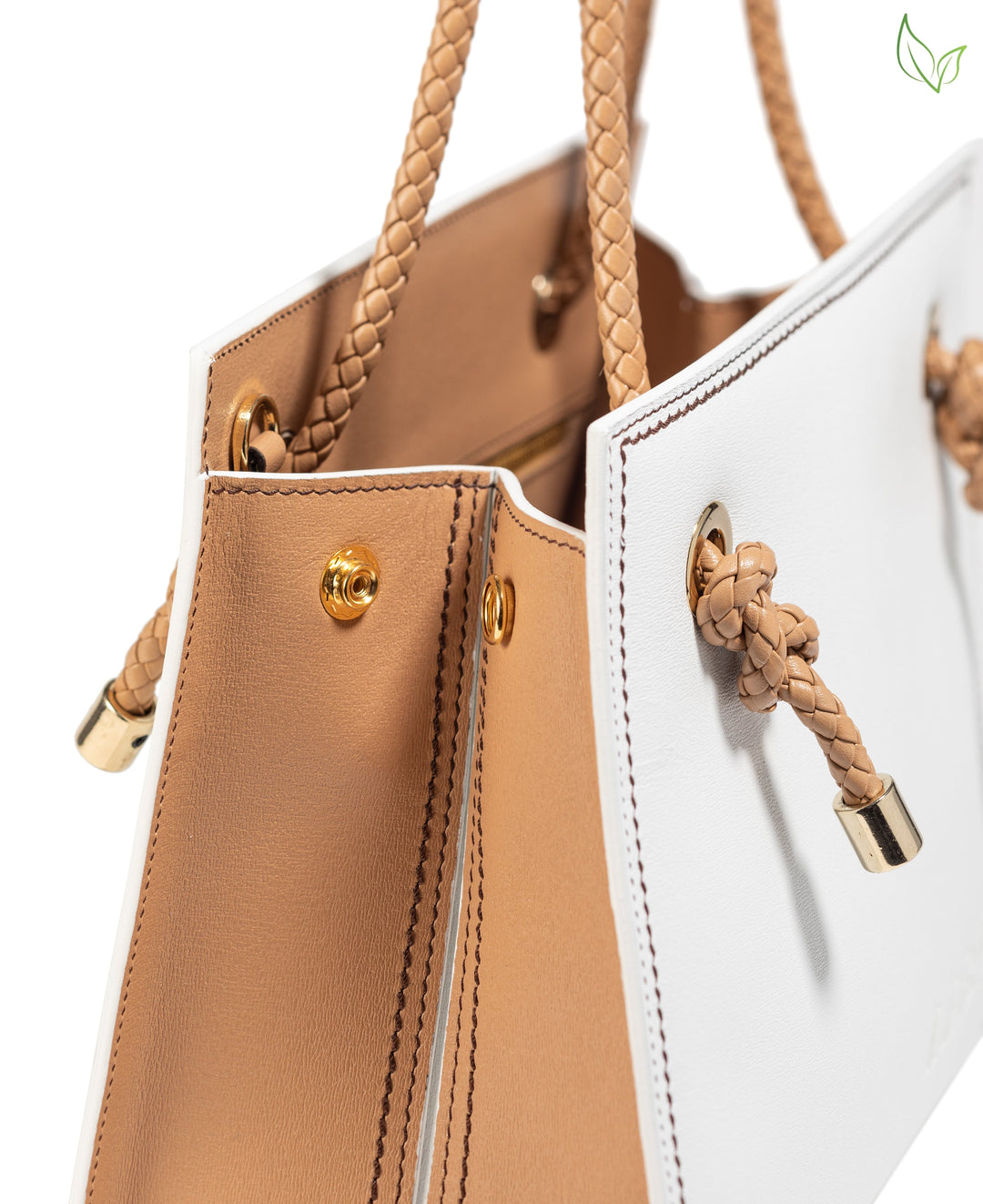 Elegant tan and white leather handbag with braided handles and gold accents