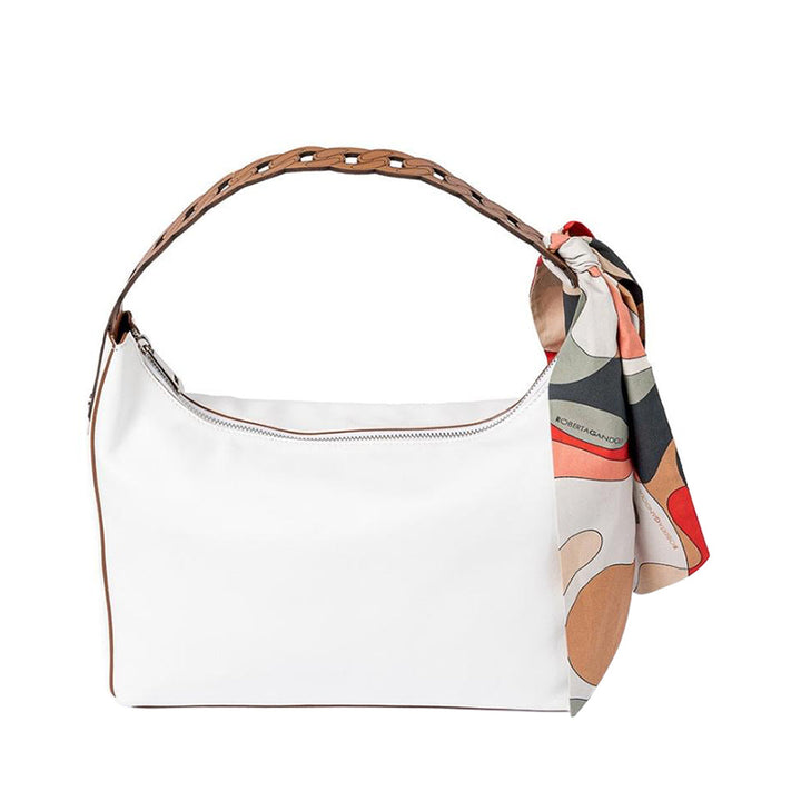 White shoulder bag with brown strap and colorful scarf accessory