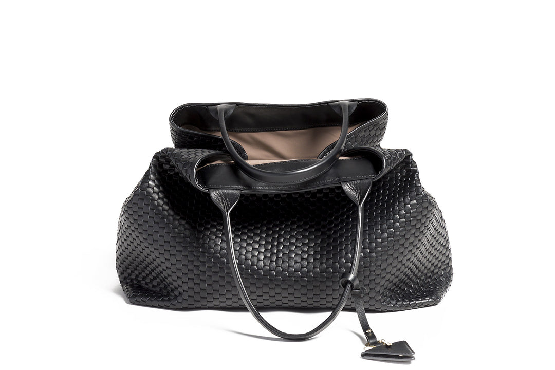 Luxury black woven handbag with leather texture and stylish design