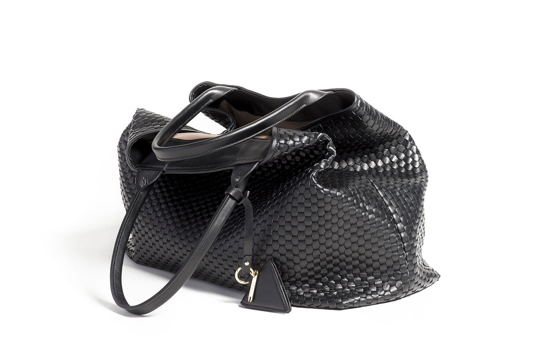 Luxury black woven handbag with leather texture and stylish design