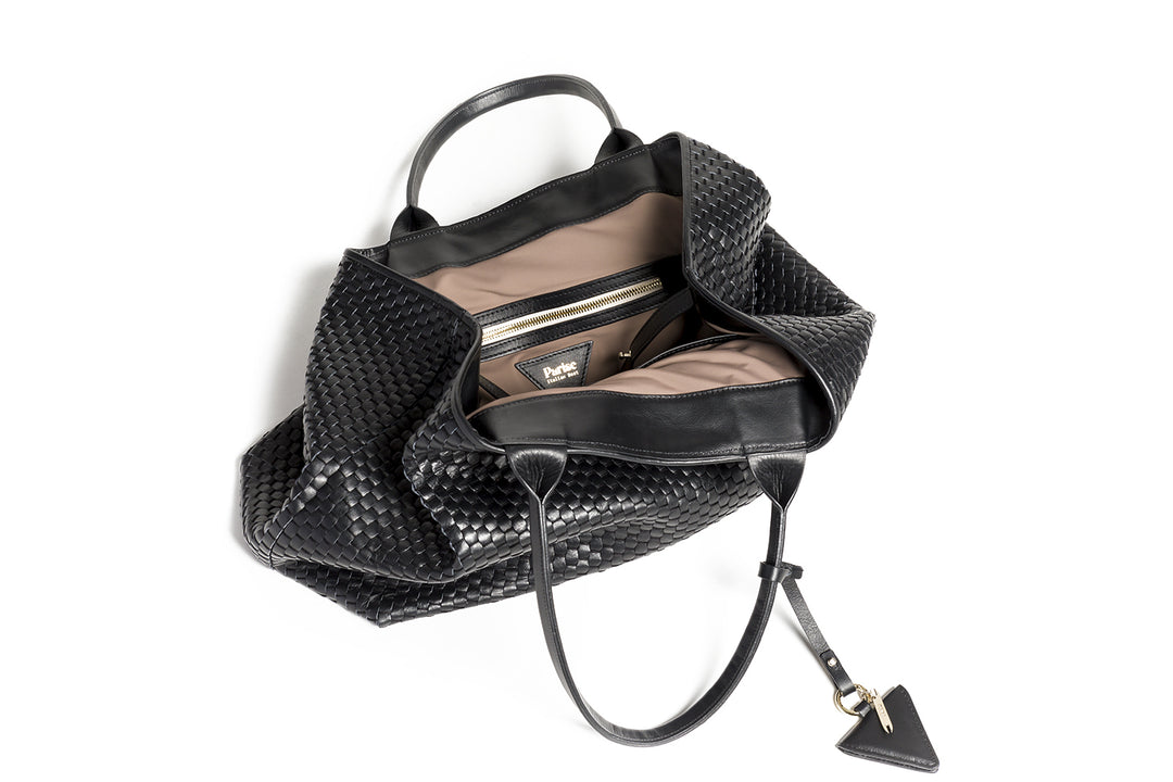 Luxury black woven handbag with leather texture and stylish design