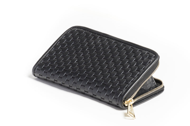 Black woven leather wallet with zipper on white background.