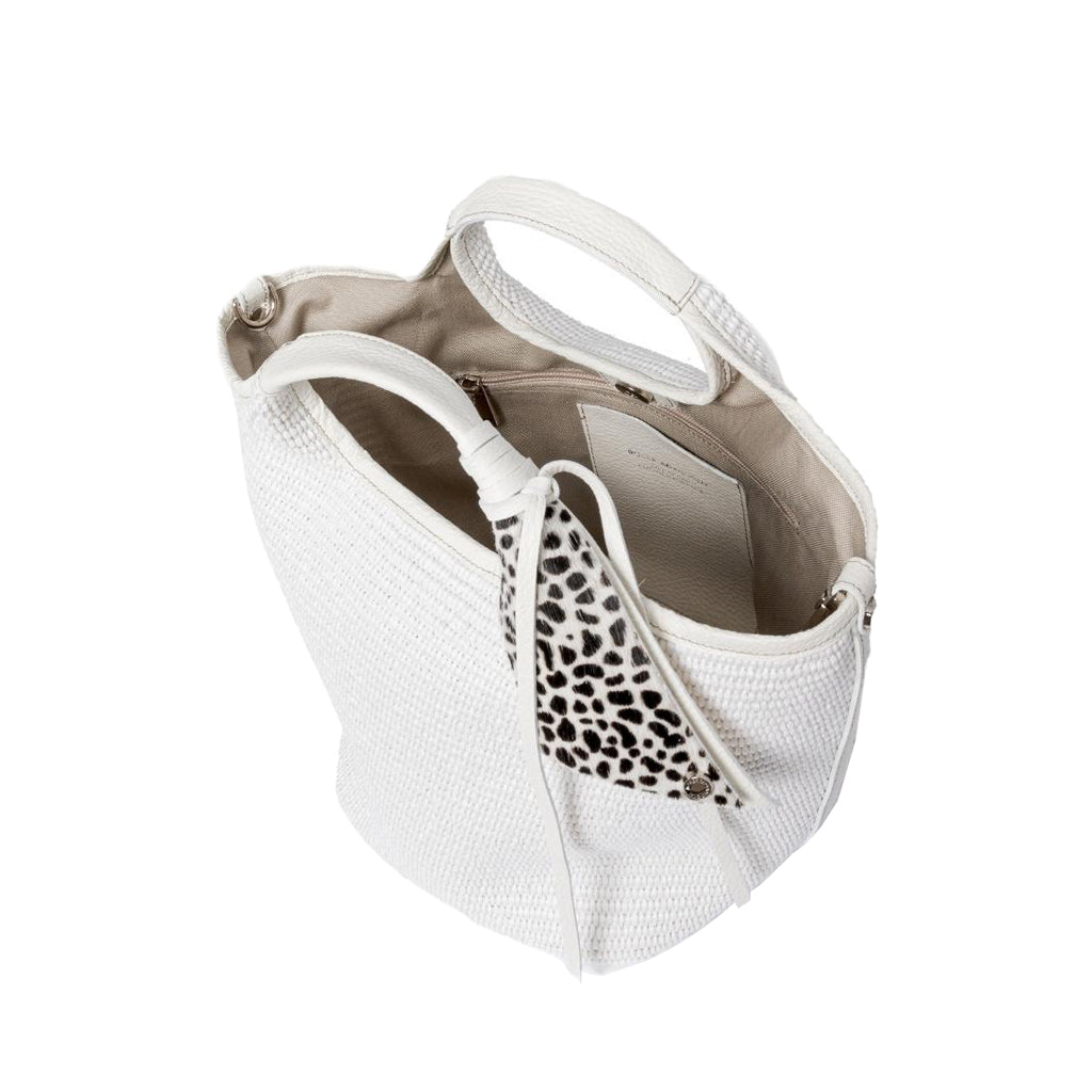 White woven handbag with leopard print scarf and interior pockets