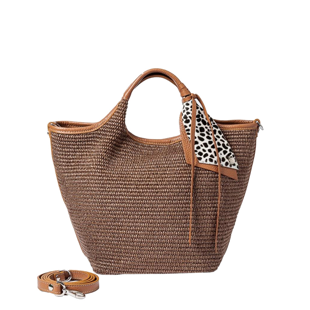 Brown woven handbag with leather handles and detachable shoulder strap, adorned with polka dot scarf