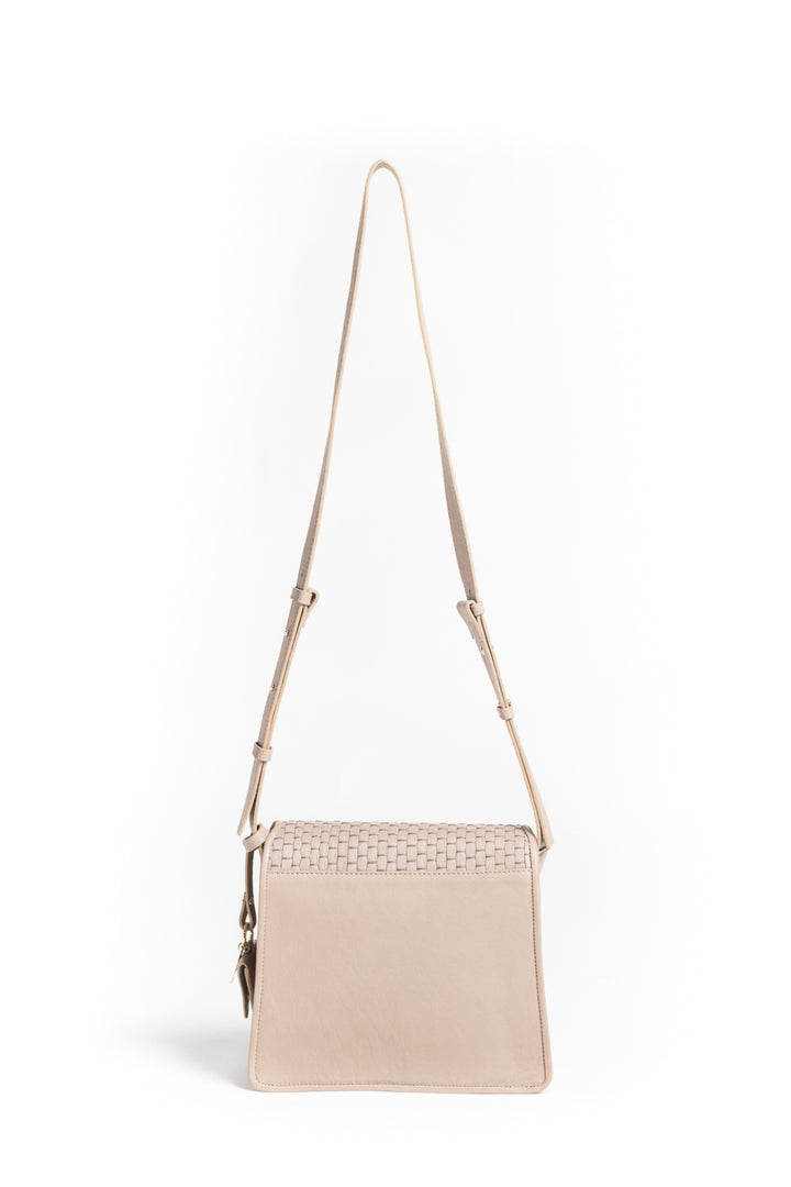 Tan woven leather crossbody handbag with adjustable strap.