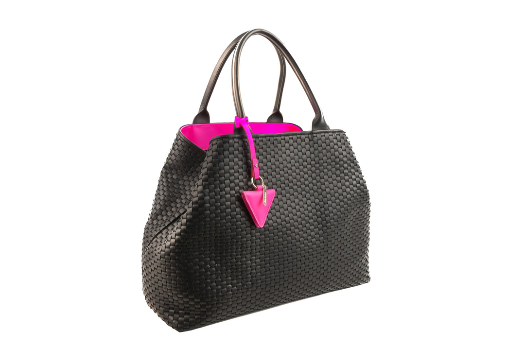 woven leather handbag with pink accents