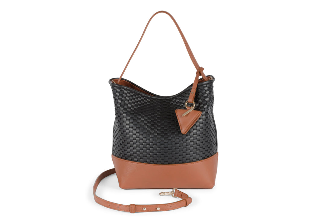 Woven black and brown leather shoulder bag with adjustable strap and triangle tassel.