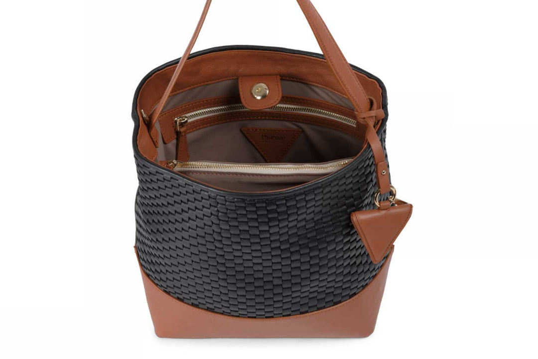 Woven black and brown leather shoulder bag with adjustable strap and triangle tassel.