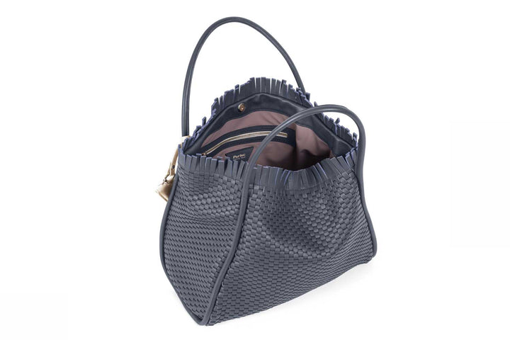 Elegant blue woven tote bag with decorative tag and unique textured design.