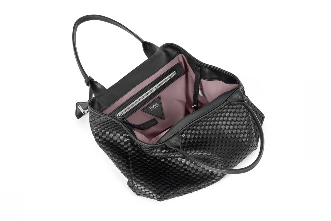 Alt tag: Elegant black woven handbag with handles and keychain accessory