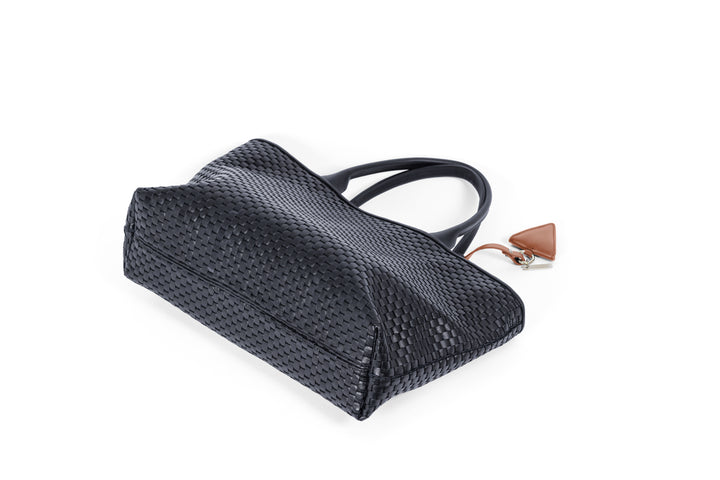 Elegant black leather woven handbag with brown accent, stylish accessory for women.