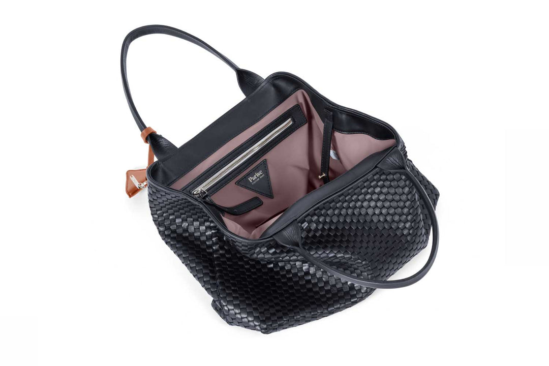 Elegant black leather woven handbag with brown accent, stylish accessory for women.