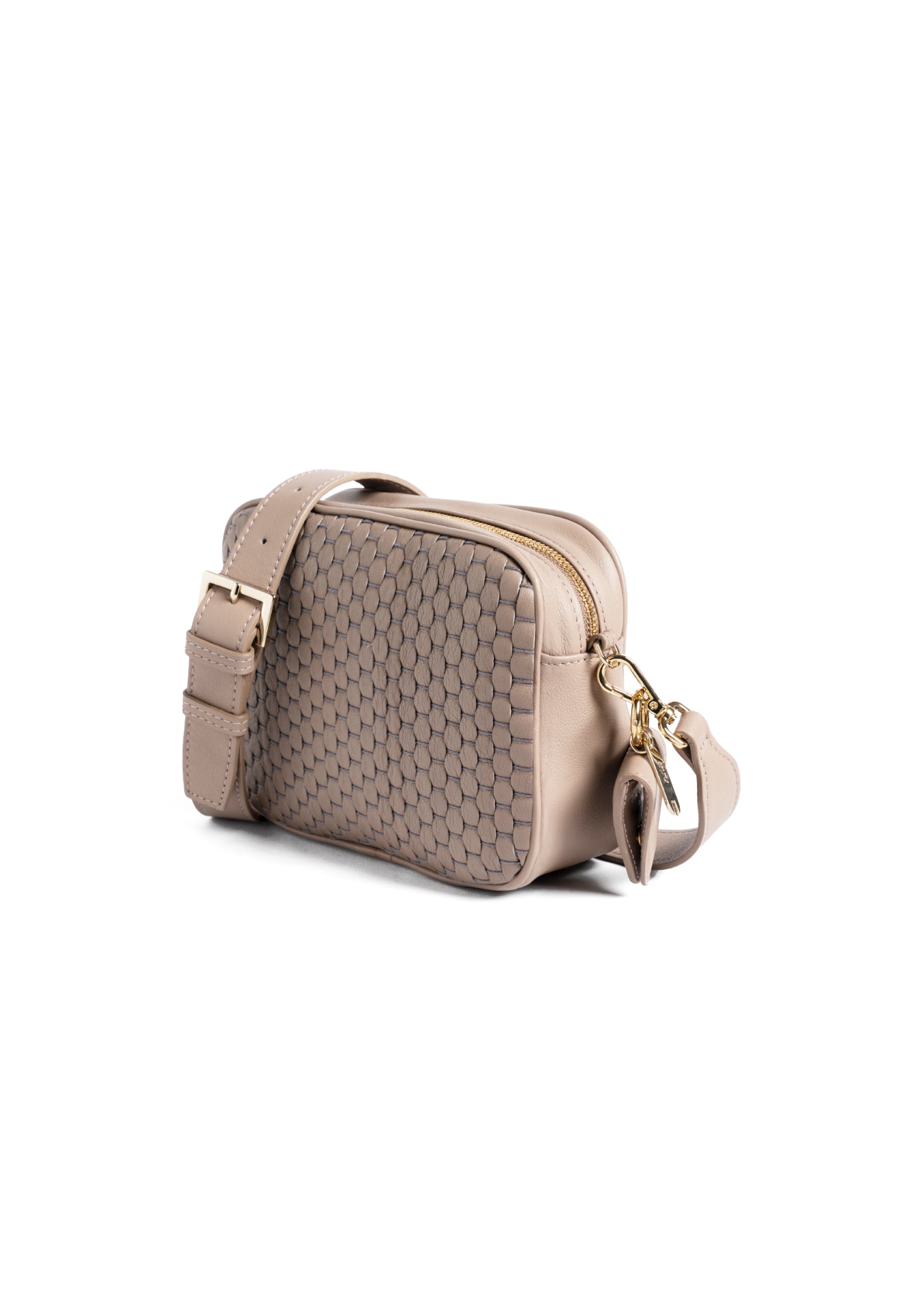 beige quilted crossbody bag with adjustable strap on white background