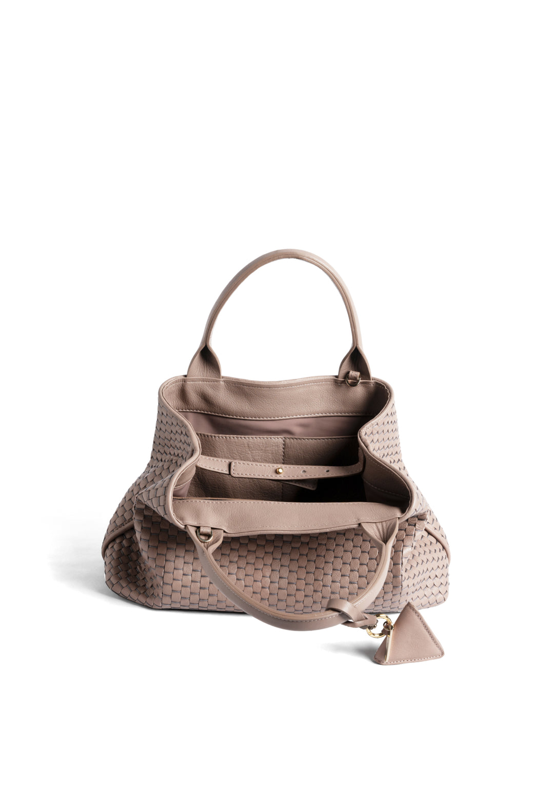 Alt text: Elegant woven leather handbag in taupe with a triangular pendant on a white background