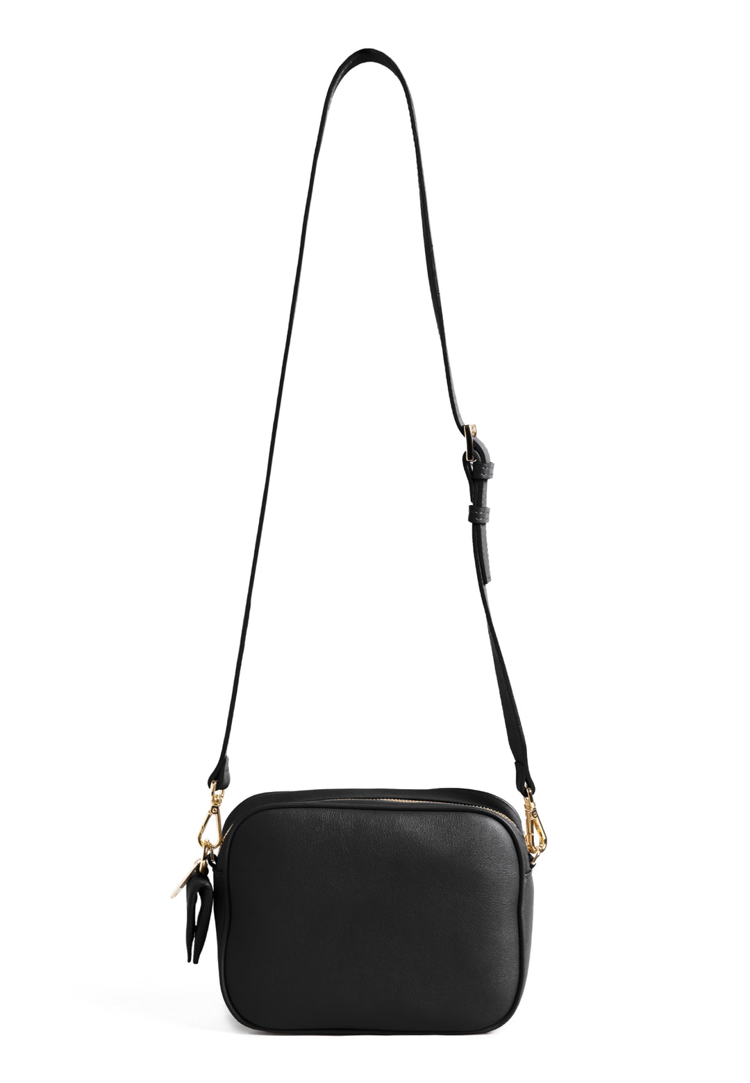 Black quilted crossbody purse with adjustable strap and gold accents.