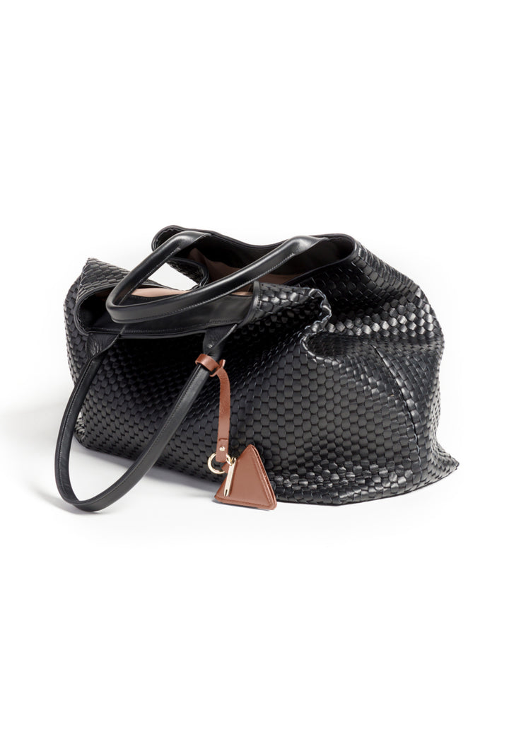 Elegant black woven leather handbag with decorative brown triangle tag.