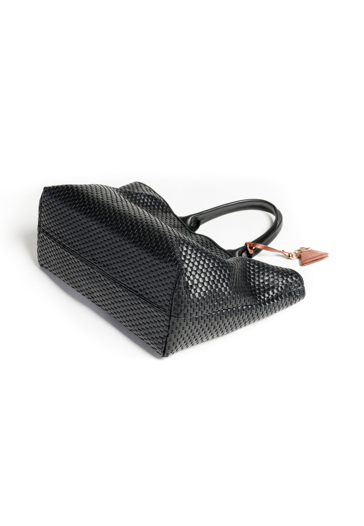 Elegant black woven leather handbag with decorative brown triangle tag.