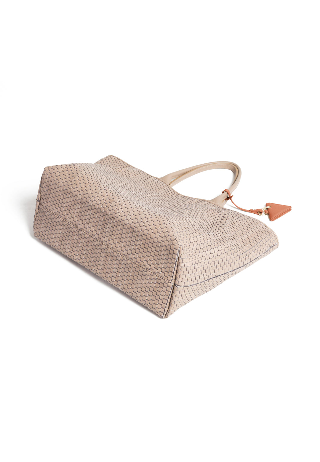 Woven beige leather tote bag with handles and a triangular leather charm.