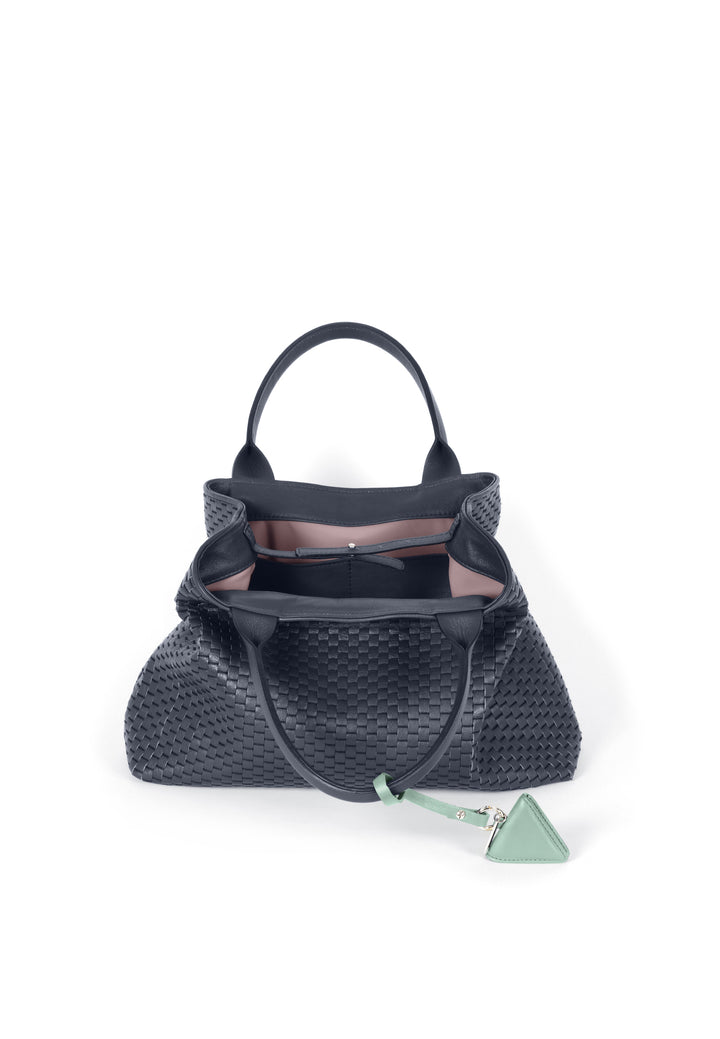 Elegant black leather woven handbag with green tag on a white background.