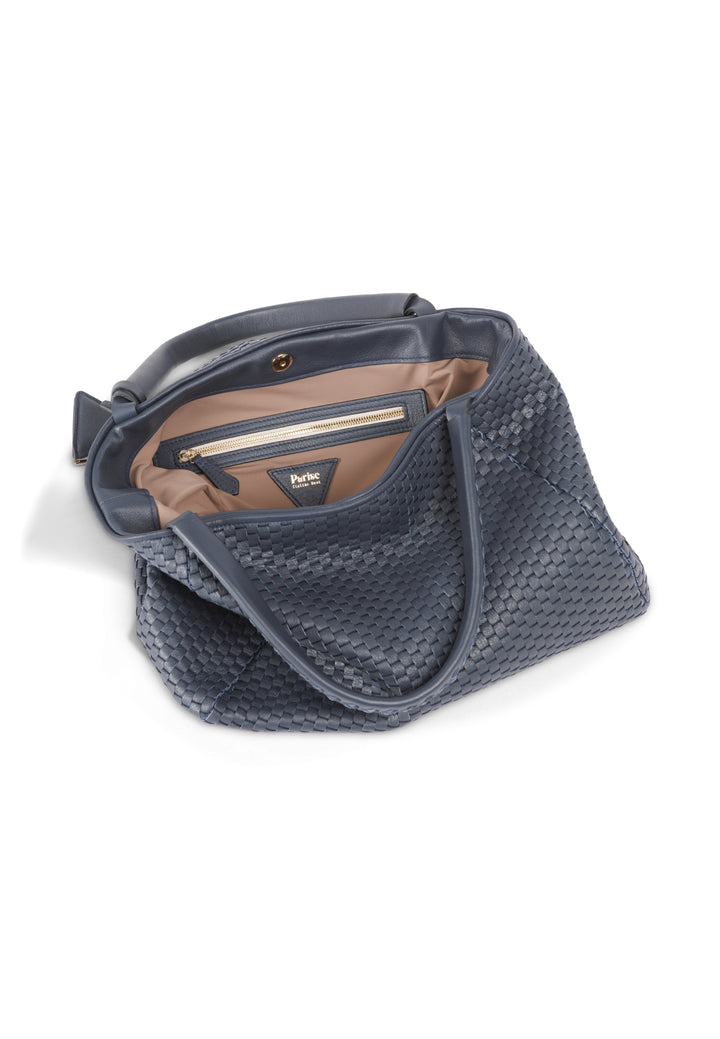 Elegant woven leather handbag in navy blue with a black triangle charm.