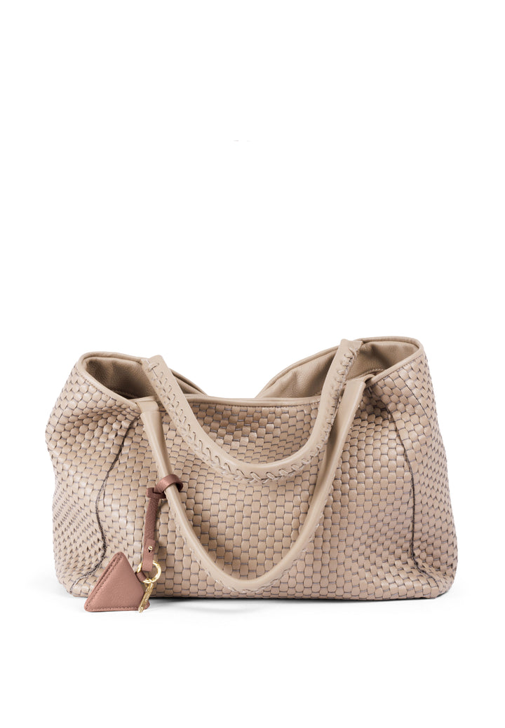 Woven beige leather handbag with shoulder straps and a decorative charm.