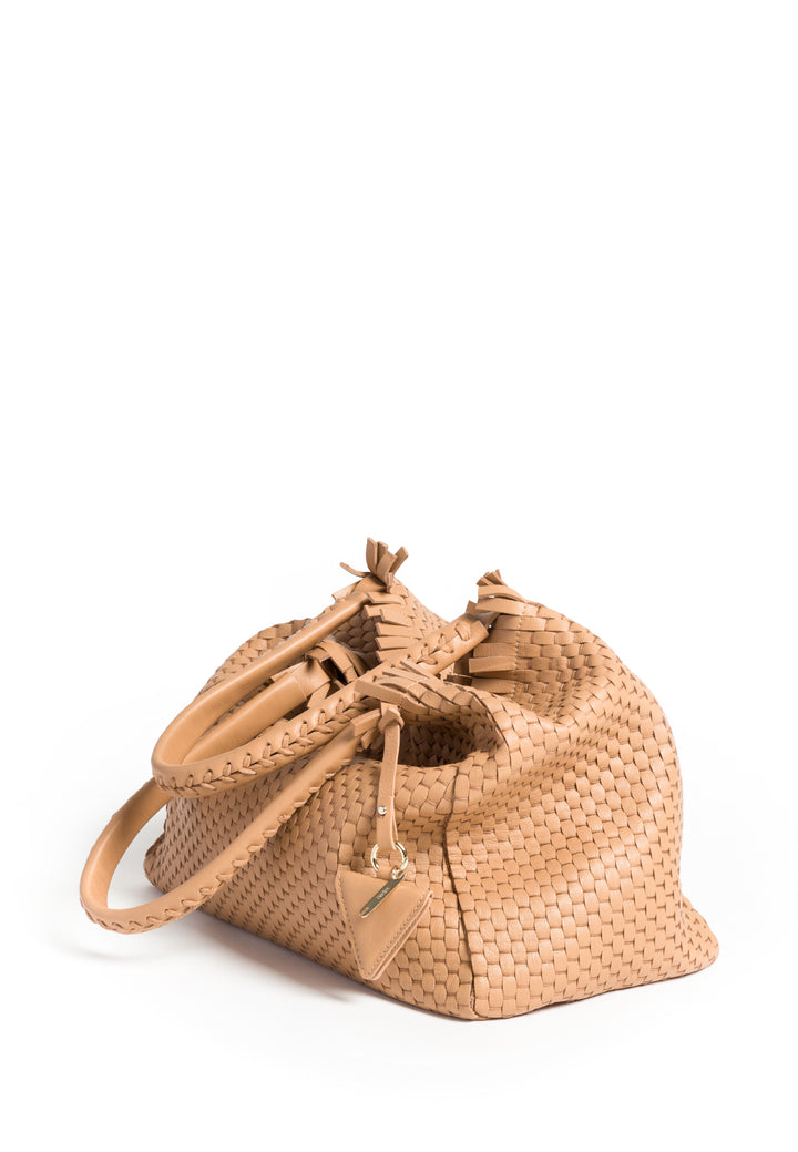 Elegant tan woven leather handbag with shoulder straps on white background.