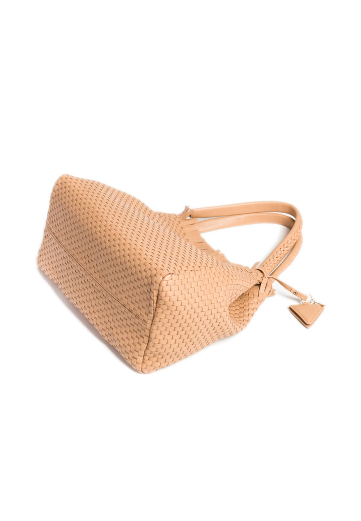 Elegant tan woven leather handbag with shoulder straps on white background.